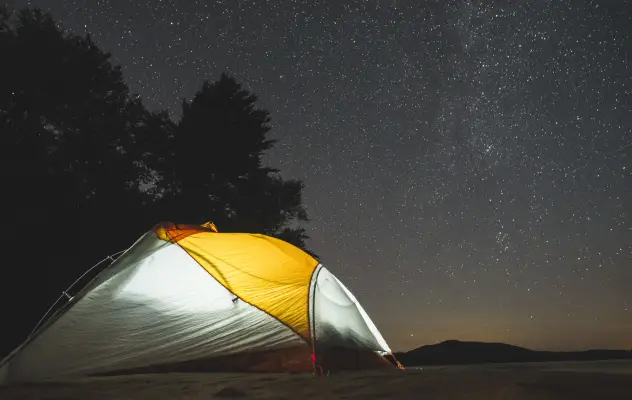 Camping under a starry sky.