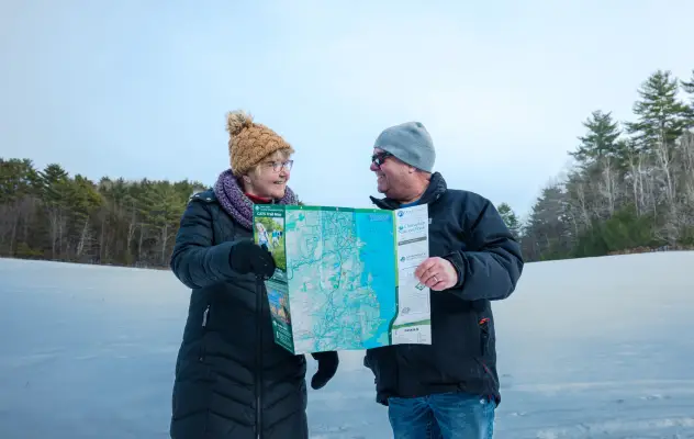 A couple looking at a map.