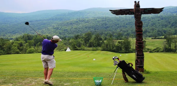 golfer at driving range