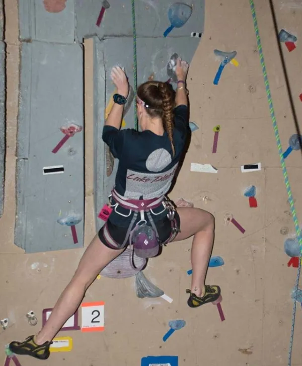 person on climbing wall