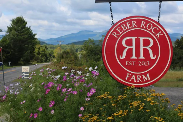 exterior sign over flower bed