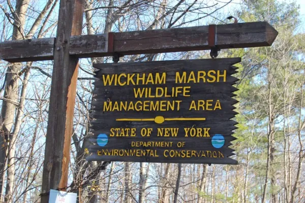 Wickham Marsh DEC sign signals a multi-use area.