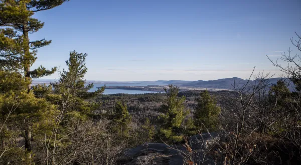 The view of a lake from a summit