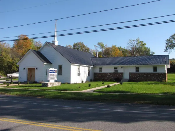 White exterior of the Assembly of God building
