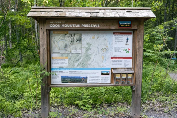 The interpretive sign for Coon Mountain Nature Preserve.