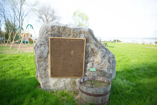 A metal plaque on a rock