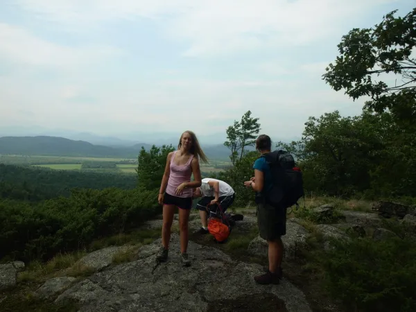 A few people on a partially open summit