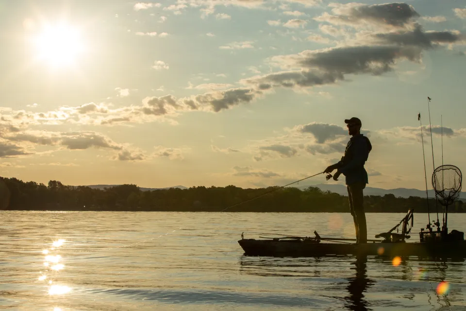 man fishing from a kayak