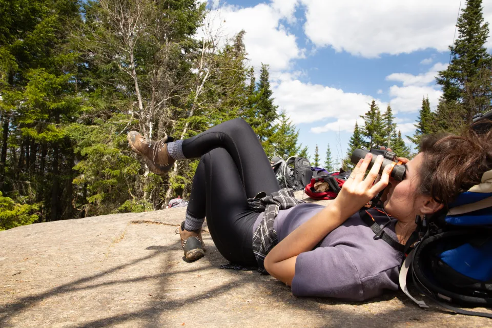 woman looking at birds