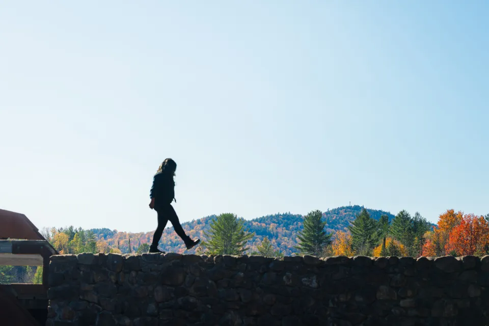 fall woman on rockwall